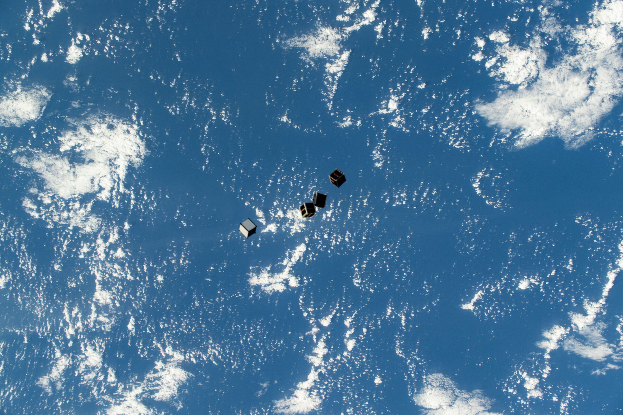 CubeSats are pictured after being deployed into Earth orbit